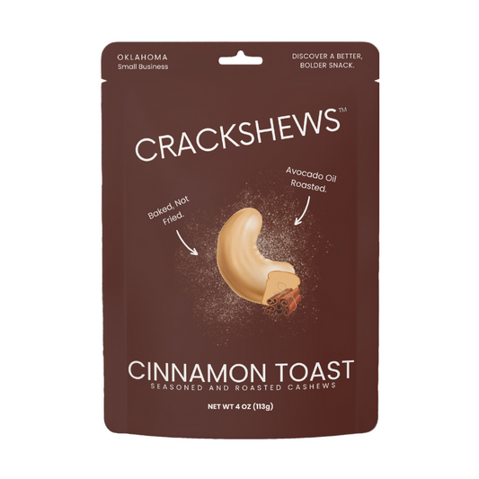 Packaging of Crackshews Cinnamon Toast cashews, 4oz, with a graphic of the cracked nut and text highlighting the flavor and product details.