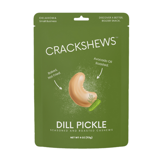 Packaging of Crackshews Dill Pickle cashews, 4oz, with a graphic of the cracked nut and text highlighting the flavor and product details.