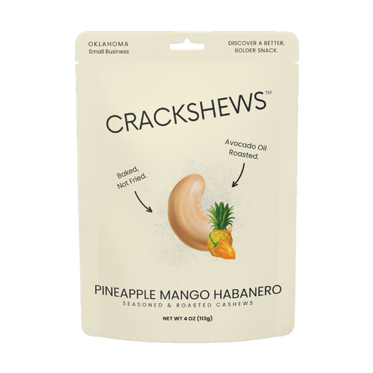 Packaging of Crackshews Pineapple Mango Habanero cashews, 4oz, with a graphic of the cracked nut and text highlighting the flavor and product details.
